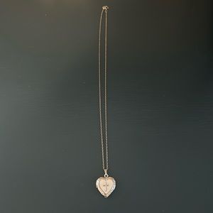 sterling Silver Heart locket With a Cross on front